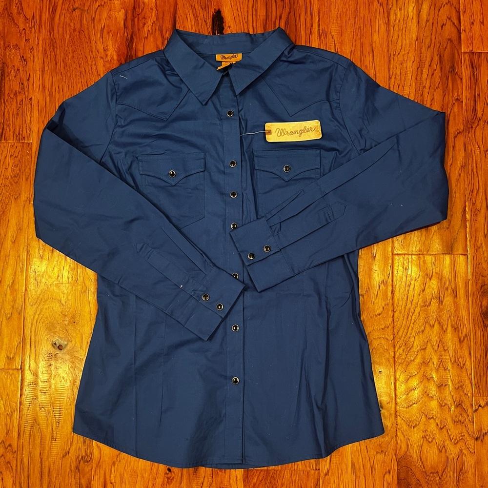 Woman’s large wrangler blue button up. 
Brand new